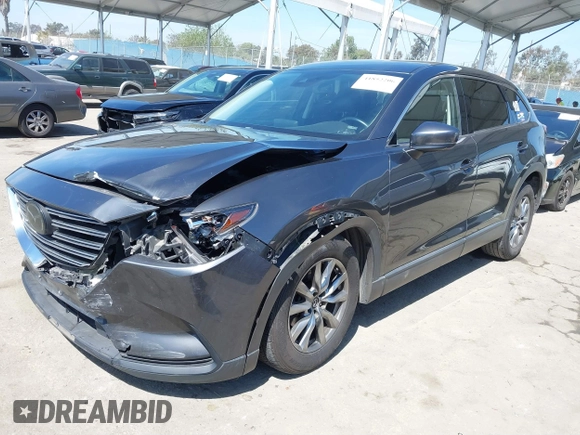 2018 Mazda CX-9 Touring with VIN JM3TCACY1J0223362, listed as a IAAI auction lot 41852200 with 94,595 mi miles. Bid and sale history available at carsss.com. Image 2.