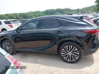 2023 Lexus RX 350 with VIN 2T2BAMCA6PC021707, listed as a IAAI auction lot 42487717 with 30,008 mi miles and . Bid and sale history available at DreamBid. Image 14.