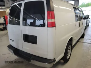 2013 Chevrolet Express Cargo with VIN 1GCSGAFX5D1110945, listed as a IAAI auction lot 42635460 with 239,048 mi miles and . Bid and sale history available at DreamBid. Image 33.