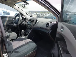 2014 Chevrolet Sonic LT with VIN 1G1JC6SHXE4135948, listed as a IAAI auction lot 41949833 with 127,202 mi miles. Bid and sale history available at carsss.com. Image 5.