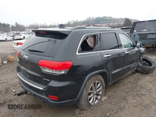 2014 Jeep Grand Cherokee Limited with VIN 1C4RJFBG2EC279944, listed as a IAAI auction lot 41591623 with 150,588 mi miles and . Bid and sale history available at DreamBid. Image 4.