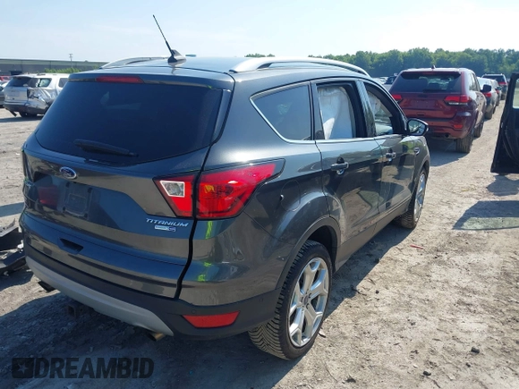 2019 Ford Escape Titanium с VIN 1FMCU9J94KUC24611, выставлен на аукционе IAAI как лот 42595286 с пробегом 77 280 миль миль и . История ставок и продаж доступна на DreamBid. Изображение 4.