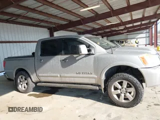 2011 Nissan Titan SL with VIN 1N6AA0EC7BN306488, listed as a IAAI auction lot 41413618 with 102,465 mi miles. Bid and sale history available at carsss.com. Image 13.