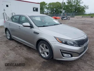 2015 Kia Optima LX z VIN 5XXGM4A73FG481956, wystawiony jako IAAI lot #42256425 z przebiegiem 116 806 mil mil oraz . Historia ofert i sprzedaży dostępna na DreamBid. Obrazek 1.