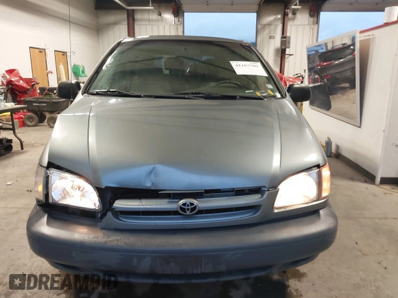 1999 Toyota Sienna CE with VIN 4T3GF19C5XU139787, listed as a IAAI auction lot 41167781 with 217,715 mi miles. Bid and sale history available at carsss.com. Image 12.