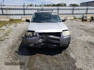 2004 Ford Escape XLT with VIN 1FMYU03184KA61209, listed as a Copart auction lot 70272044 with 120,400 mi miles and Salvage Title. Bid and sale history available at carsss.com. Image 5.