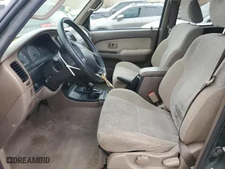 1999 Toyota 4Runner SR5 with VIN JT3HN86R9X0250487, listed as a Copart auction lot 49077965 with 221,954 mi miles and Salvage Title. Bid and sale history available at carsss.com. Image 7.