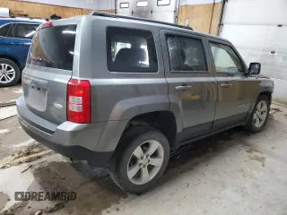 2014 Jeep Patriot Latitude with VIN 1C4NJRFBXED546921, listed as a Copart auction lot 61032895 with 133,344 mi miles and Clean title. Bid and sale history available at DreamBid. Image 3.