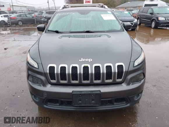 2014 Jeep Cherokee Latitude z VIN 1C4PJMCS5EW137875, wystawiony jako IAAI lot #41475923 z przebiegiem 124 565 mil mil oraz . Historia ofert i sprzedaży dostępna na DreamBid. Obrazek 12.