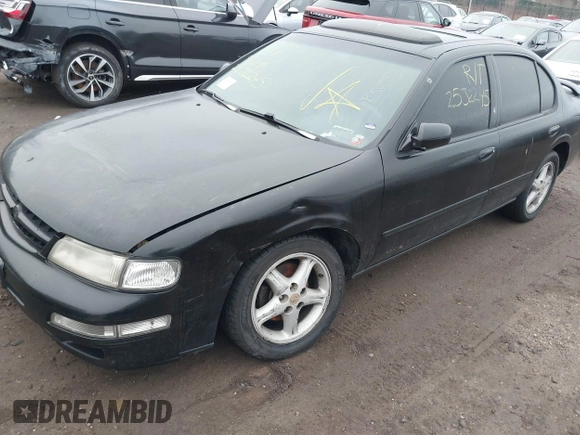 1998 Nissan Maxima GXE z VIN JN1CA21A7WM805575, wystawiony jako IAAI lot #41726198 z przebiegiem Nie podano mil oraz . Historia ofert i sprzedaży dostępna na DreamBid. Obrazek 6.
