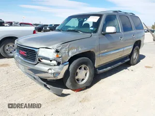 2003 GMC Yukon SLT with VIN 1GKEC13V33R298333, listed as a IAAI auction lot 41582447 with 166,047 mi miles. Bid and sale history available at carsss.com. Image 17.