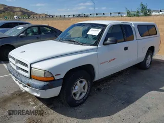 1999 Dodge Dakota with VIN 1B7FL22P0XS288012, listed as a IAAI auction lot 41695852 with 150,431 mi miles. Bid and sale history available at carsss.com. Image 2.