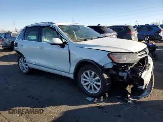 2012 Volkswagen Touareg Exec with VIN WVGEF9BP7CD009869, listed as a Copart auction lot 88099145 with Not Provided miles and Salvage Title. Bid and sale history available at DreamBid. Image 4.