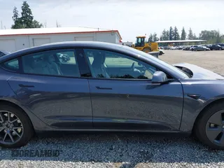 2023 Tesla Model 3 with VIN 5YJ3E1EA6PF664045, listed as a IAAI auction lot 42561039 with 18,708 mi miles and . Bid and sale history available at DreamBid. Image 14.