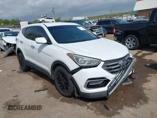 2017 Hyundai Santa Fe 2.4L z VIN 5XYZTDLB3HG439072, wystawiony jako IAAI lot #42061127 z przebiegiem 145 864 mil mil oraz . Historia ofert i sprzedaży dostępna na DreamBid. Obrazek 1.