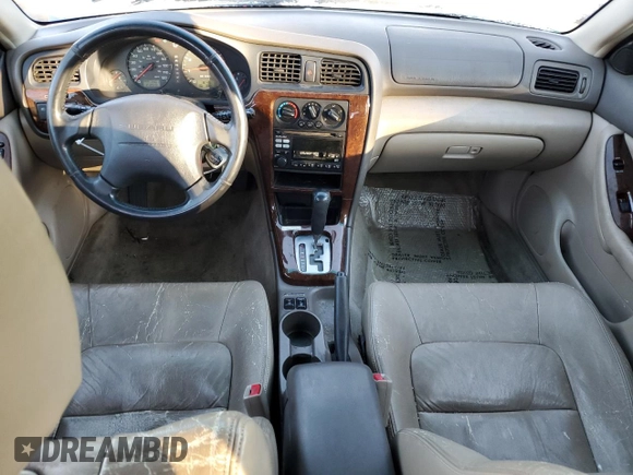 2002 Subaru Legacy Outback Limited with VIN 4S3BH686527652037, listed as a Copart auction lot 83311474 with 212,548 mi miles and Salvage title. Bid and sale history available at DreamBid. Image 8.