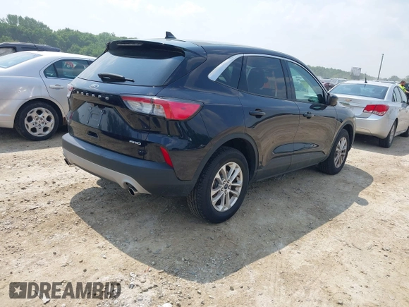 2021 Ford Escape SE with VIN 1FMCU9G65MUB03411, listed as a IAAI auction lot 42423432 with 121,755 mi miles and . Bid and sale history available at DreamBid. Image 4.