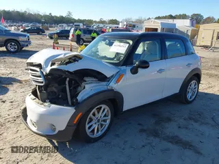 2015 MINI Countryman z VIN WMWZB3C53FWR43884, wystawiony jako IAAI lot #41296213 z przebiegiem 111 934 mil mil oraz . Historia ofert i sprzedaży dostępna na DreamBid. Obrazek 18.