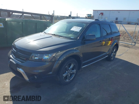 2016 Dodge Journey Crossroad Plus z VIN 3C4PDDGGXGT135934, wystawiony jako IAAI lot #41976026 z przebiegiem 141 181 mil mil oraz . Historia ofert i sprzedaży dostępna na DreamBid. Obrazek 17.