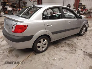 2009 Kia Rio LX with VIN KNADE223596444133, listed as a IAAI auction lot 41598865 with Not Provided miles and . Bid and sale history available at DreamBid. Image 4.