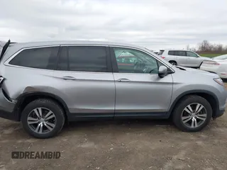 2017 Honda Pilot EX-L with VIN 5FNYF6H5XHB014067, listed as a IAAI auction lot 42083742 with 143,043 mi miles and . Bid and sale history available at DreamBid. Image 13.