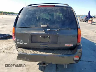 2003 GMC Envoy SLT z VIN 1GKDS13S332281271, wystawiony jako Copart lot #53685775 z przebiegiem 236 997 mil mil oraz Szkody całkowita. Historia ofert i sprzedaży dostępna na DreamBid. Obrazek 6.
