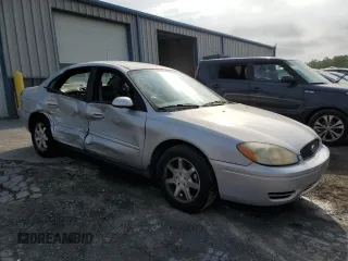 2007 Ford Taurus SEL with VIN 1FAFP56U57A126684, listed as a Copart auction lot 57342035 with 158,293 mi miles and Salvage title. Bid and sale history available at DreamBid. Image 4.