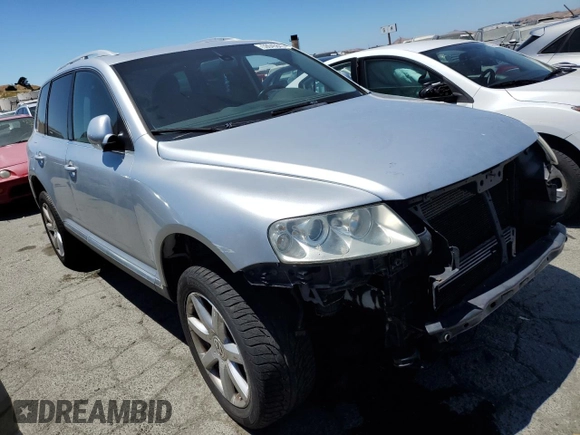 2004 Volkswagen Touareg z VIN WVGCM77L74D059969, wystawiony jako Copart lot #68238193 z przebiegiem Nie podano mil oraz Szkody całkowita. Historia ofert i sprzedaży dostępna na DreamBid. Obrazek 4.