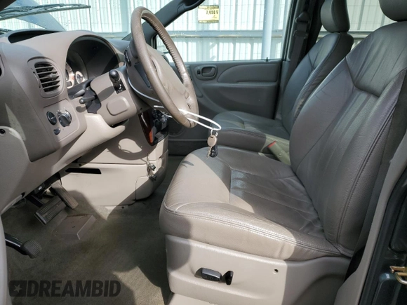 2002 Chrysler Town & Country LXi with VIN 2C8GP54L32R676672, listed as a Copart auction lot 44120565 with 57,090 mi miles and Salvage Title. Bid and sale history available at carsss.com. Image 7.