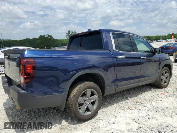 2023 Honda Ridgeline RTL-E with VIN 5FPYK3F74PB037333, listed as a Copart auction lot 56209715 with 36,041 mi miles and Salvage title. Bid and sale history available at DreamBid. Image 3.