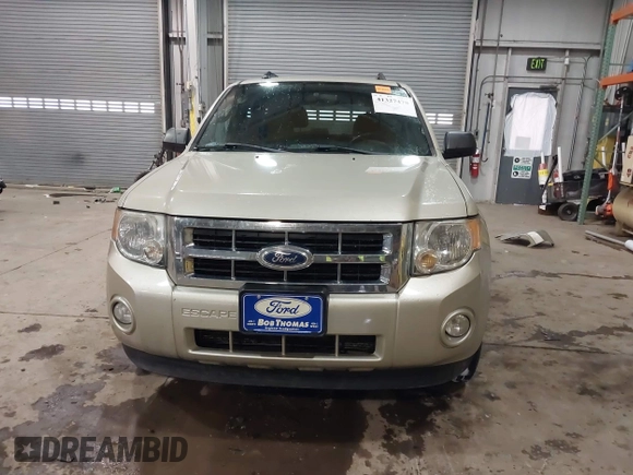 2011 Ford Escape XLT with VIN 1FMCU0D75BKB11168, listed as a IAAI auction lot 41327470 with 136,610 mi miles. Bid and sale history available at carsss.com. Image 13.