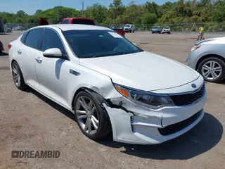 2016 Kia Optima LX with VIN KNAGT4L32G5085128, listed as a IAAI auction lot 42016728 with 259,218 mi miles. Bid and sale history available at carsss.com. Image 1.