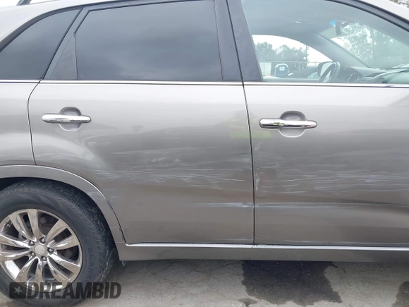 2013 Kia Sorento SX z VIN 5XYKW4A23DG400942, wystawiony jako IAAI lot #42185267 z przebiegiem 162 209 mil mil oraz . Historia ofert i sprzedaży dostępna na DreamBid. Obrazek 17.