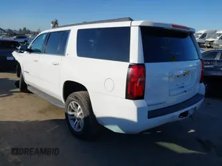 2015 Chevrolet Suburban LT with VIN 1GNSCJKC2FR680413, listed as a IAAI auction lot 41634666 with 127,175 mi miles and . Bid and sale history available at DreamBid. Image 3.