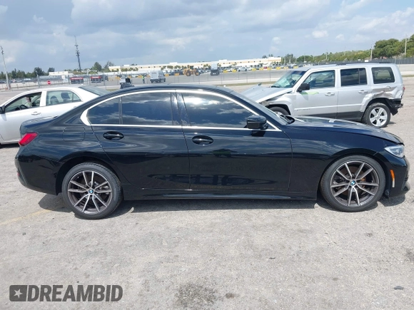 2021 BMW 3 Series 330i with VIN 3MW5R1J09M8B93600, listed as a IAAI auction lot 41735270 with 77,648 mi miles. Bid and sale history available at carsss.com. Image 13.