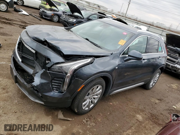 2020 Cadillac XT4 FWD Premium Luxury z VIN 1GYFZCR43LF050118, wystawiony jako Copart lot #49529635 z przebiegiem 93 290 mil mil oraz Tytuł czysty. Historia ofert i sprzedaży dostępna na DreamBid. Obrazek 1.