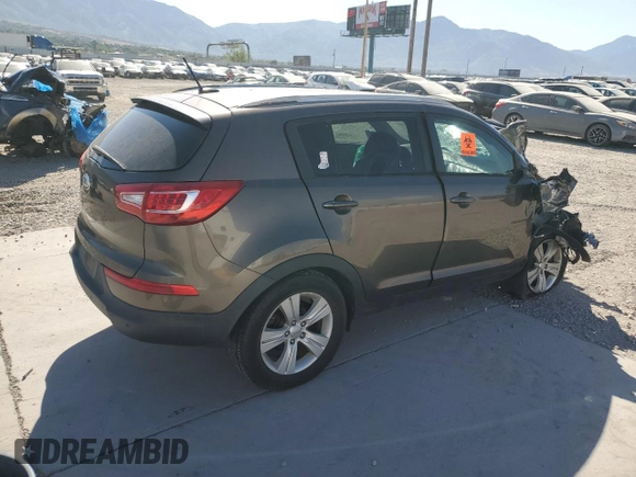 2013 Kia Sportage LX with VIN KNDPBCA23D7371824, listed as a Copart auction lot 60341775 with Not provided miles and Salvage title. Bid and sale history available at DreamBid. Image 3.