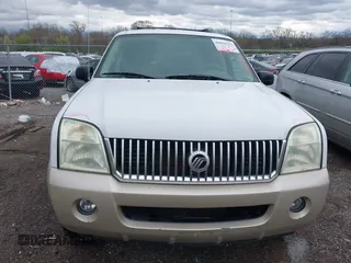2005 Mercury Mountaineer Convenience z VIN 4M2DU86K15ZJ26605, wystawiony jako IAAI lot #41831527 z przebiegiem 211 080 mil mil oraz . Historia ofert i sprzedaży dostępna na DreamBid. Obrazek 12.