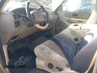 2001 Ford F-150 XL with VIN 1FTPF17L61NC01103, listed as a IAAI auction lot 41586637 with 194,689 mi miles and . Bid and sale history available at DreamBid. Image 5.