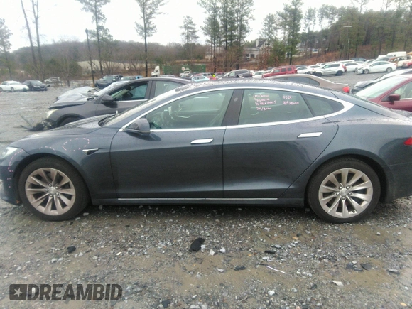 2016 Tesla Model S 70 with VIN 5YJSA1E13GF174542, listed as a IAAI auction lot 41169279 with 72,691 mi miles and . Bid and sale history available at DreamBid. Image 14.