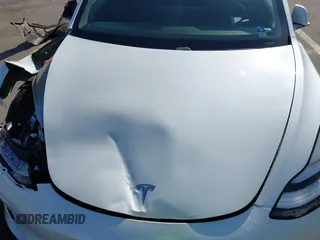 2019 Tesla Model 3 Long Range with VIN 5YJ3E1EB1KF510912, listed as a IAAI auction lot 41857775 with Not Provided miles and . Bid and sale history available at DreamBid. Image 10.