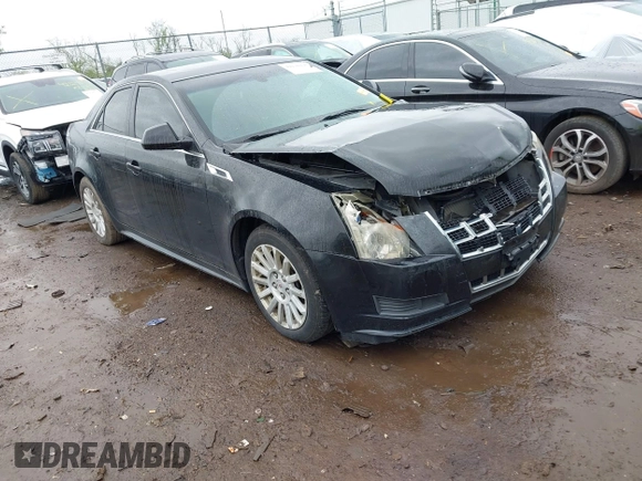 2013 Cadillac CTS Luxury z VIN 1G6DG5E52D0111849, wystawiony jako IAAI lot #42130235 z przebiegiem 129 993 mil mil oraz . Historia ofert i sprzedaży dostępna na DreamBid. Obrazek 1.