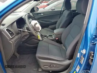 2019 Hyundai Tucson Value with VIN KM8J33A48KU913336, listed as a Copart auction lot 57070025 with 83,037 mi miles and Salvage title. Bid and sale history available at DreamBid. Image 7.