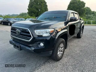 2019 Toyota Tacoma SR z VIN 3TMCZ5AN0KM203691, wystawiony jako Copart lot #60376205 z przebiegiem 218 516 mil mil oraz Czysty tytuł • Clean title. Historia ofert i sprzedaży dostępna na DreamBid. Obrazek 2.