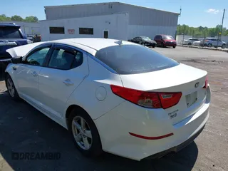2015 Kia Optima LX z VIN KNAGM4A75F5557033, wystawiony jako IAAI lot #42050025 z przebiegiem 116 198 mil mil oraz . Historia ofert i sprzedaży dostępna na DreamBid. Obrazek 3.