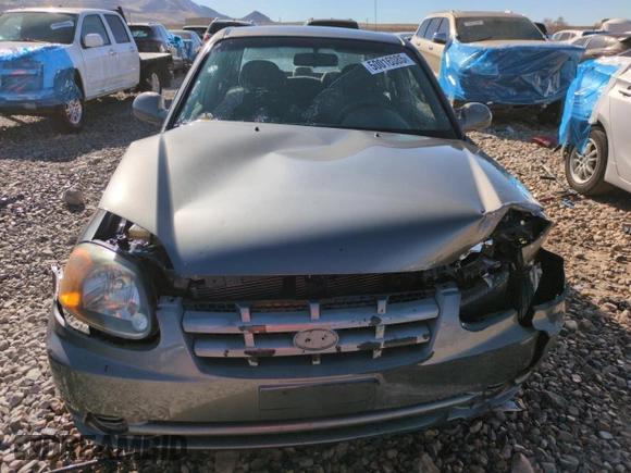 2004 Hyundai Accent GL with VIN KMHCG45C94U523529, listed as a Copart auction lot 50016085 with 188,120 mi miles and Salvage Title. Bid and sale history available at carsss.com. Image 5.