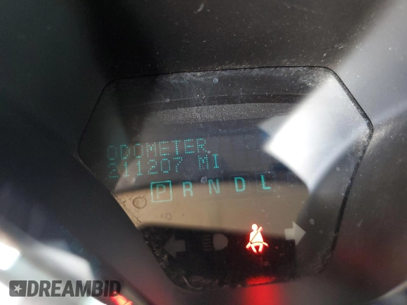 2015 Chevrolet Traverse LT with VIN 1GNKRGKD6FJ313068, listed as a Copart auction lot 57554715 with 211,207 mi miles and Salvage title. Bid and sale history available at DreamBid. Image 9.