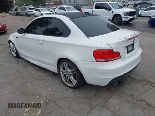 2013 BMW 1 Series 135i with VIN WBAUC9C54DVY60154, listed as a IAAI auction lot 42354743 with 159,571 mi miles and . Bid and sale history available at DreamBid. Image 3.