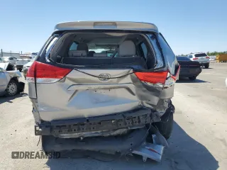 2014 Toyota Sienna XLE with VIN 5TDYK3DCXES496657, listed as a Copart auction lot 60498015 with 178,486 mi miles and Salvage title. Bid and sale history available at DreamBid. Image 6.
