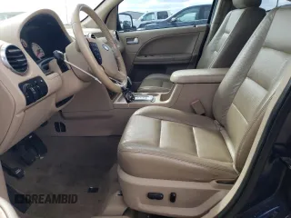 2005 Ford Freestyle Limited with VIN 1FMDK06155GA53640, listed as a Copart auction lot 48437095 with 143,183 mi miles and Salvage Title. Bid and sale history available at carsss.com. Image 7.